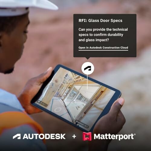 Construction worker using Autodesk and Matterport on a tablet.