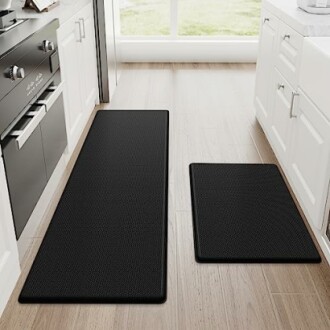 Black kitchen rug set on wooden floor