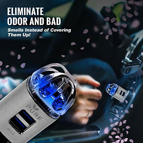 Car air purifier with blue light plugged into a vehicle vent.
