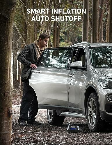 Person using smart inflation device on car tire in forest