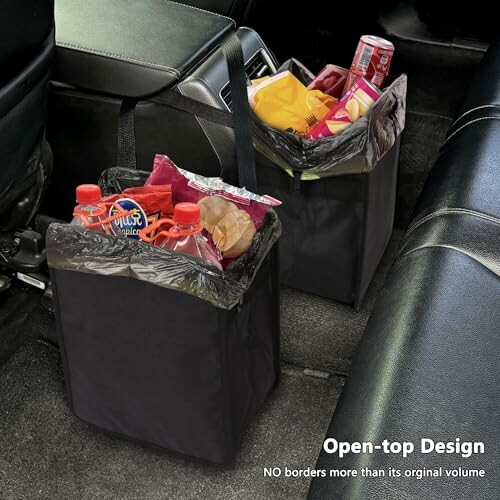 Car interior with two black open-top trash bags filled with various items.