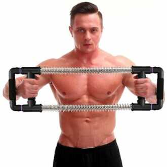 Man using a chest expander for exercise