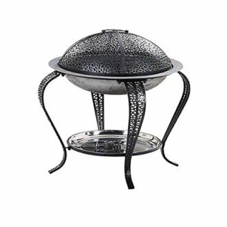 Decorative metal fire pit with intricate design and curved legs.