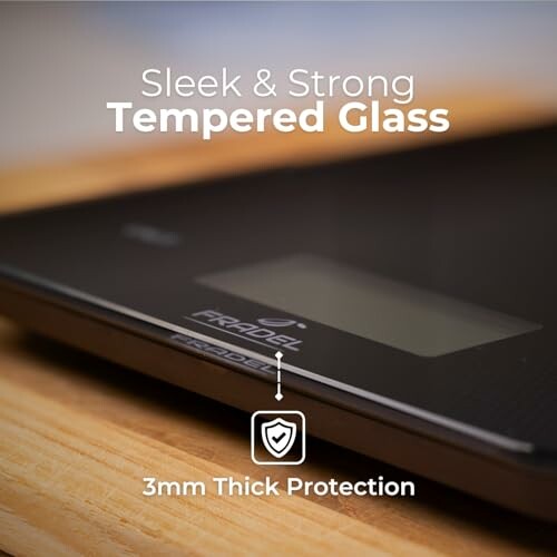 Digital scale with sleek tempered glass and 3mm thick protection.