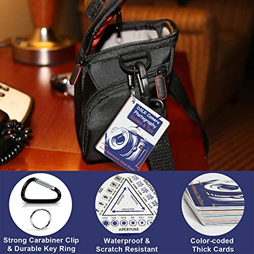 Photography cheat sheets attached to a camera bag with a carabiner clip.