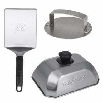 Set of griddle accessories including a spatula, press, and basting cover.