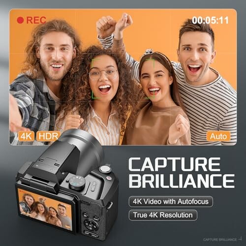Group of friends excitedly filming with camera showing 4K HDR recording.