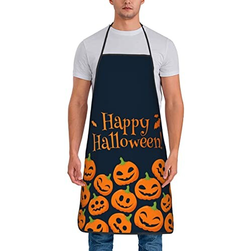 Person wearing a Halloween apron with pumpkin designs and 'Happy Halloween' text.
