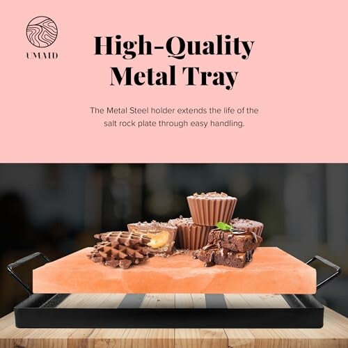 Metal tray with desserts on a salt rock plate