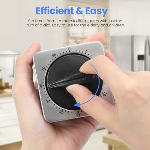 Hand adjusting a kitchen timer with a dial.