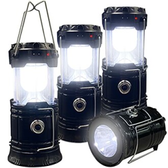 Set of four black LED camping lanterns with bright light.