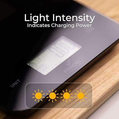 Digital scale displaying light intensity as charging power.
