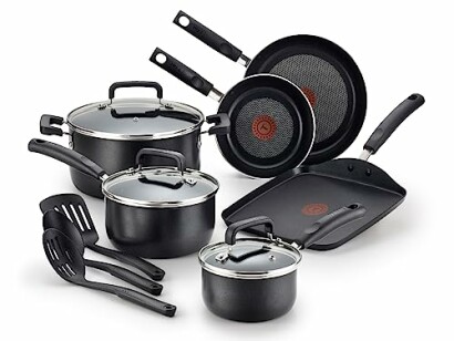 Nonstick cookware set with pots, pans, and utensils.