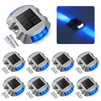 Set of solar-powered deck lights with blue LED illumination.