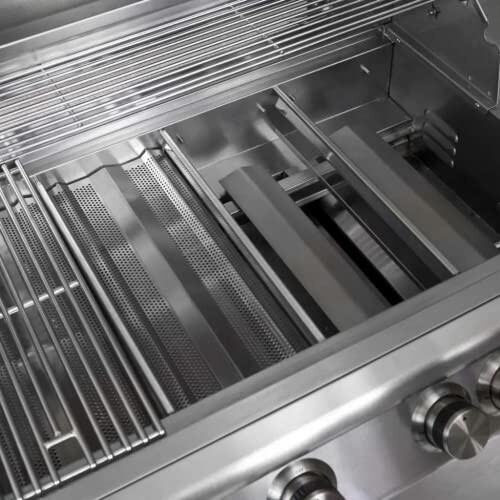 Interior of a stainless steel gas grill with grates and burners.