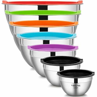 Set of stainless steel mixing bowls with colorful lids