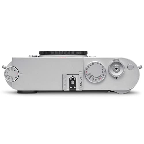Top view of a vintage camera with dials and controls.